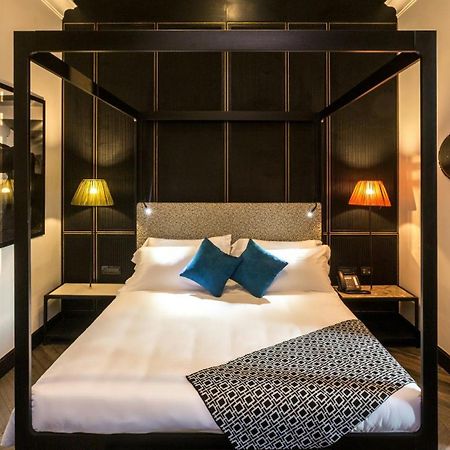 The H'All Tailor Suite Roma Eksteriør billede A room at the hotel